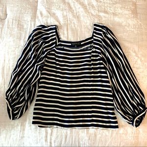 Blue and white striped blouse with square neck and button back.